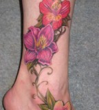 Pink and Red Hibiscus Tattoo On Foot