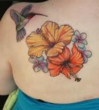 Beautiful Hibiscus Tattoos On Upper Back Picture