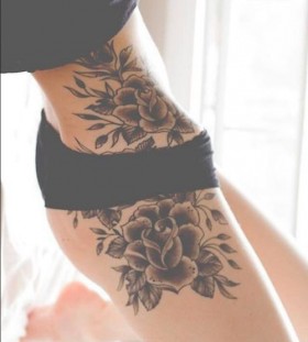 hip and leg rose back and grey flower tattoo