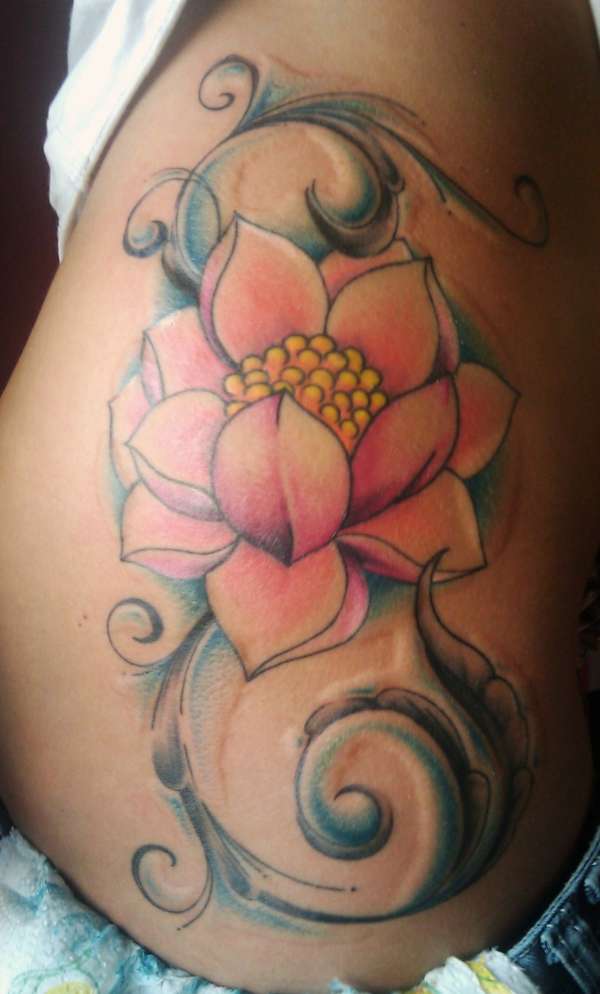 Flower Shaped Hip Tattoo Design for Girls
