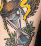 Blue Hourglass with Yellow Wing Tattoo Design