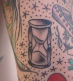 Hourglass and Star Tattoo Design