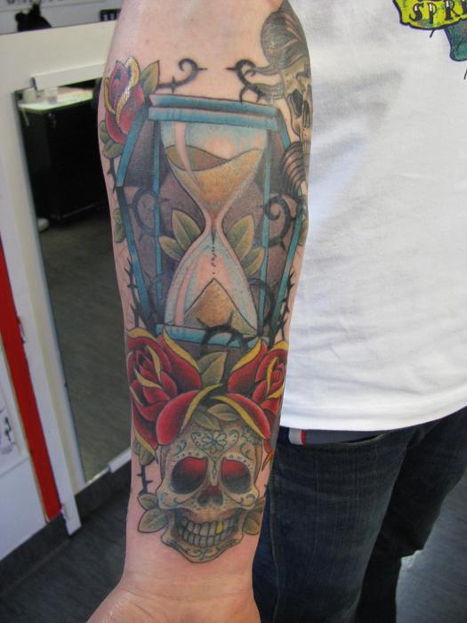 Hourglass with Crowned Skull tattoo Design