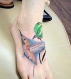 Peaceful Hummingbird Tattoos Design on Foot