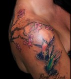 Hummingbird Tattoo And Pink Flower On Shoulder