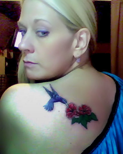 Green Hummingbird And Red Flower Tattoo On Left shoulder.