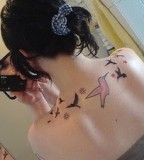 Flying Hummingbirds Tattoo Design on Upper Back