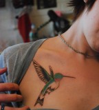 Small Hummingbird Tattoo Design on Chest