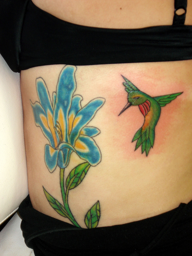 Green Hummingbird Tattoo Design on Stomach