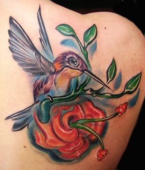 Hummingbird with Red FLower Tattoo Design