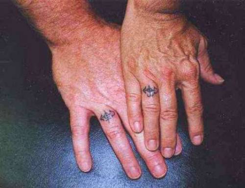 Pian Husband And Wife Matching Tattoos Photo