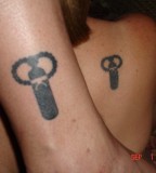 Love Key Matching Tattoos For Couples On Forearm