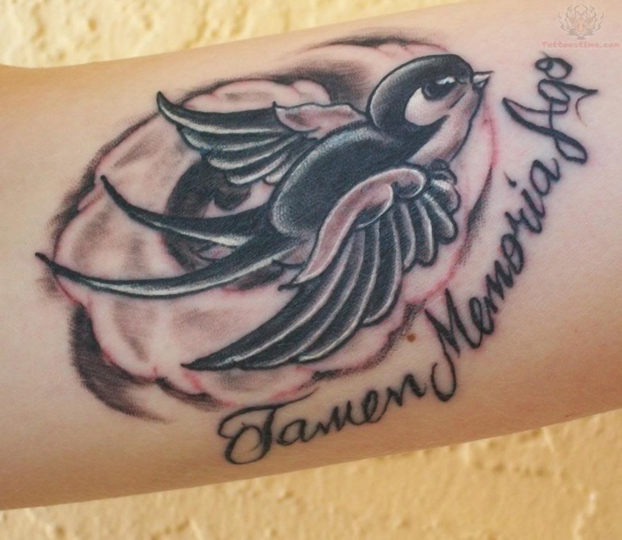 Swallow In Loving Memory Themed Tattoo Design on Forearm