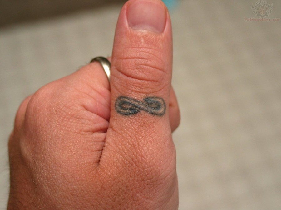 Simple Infinity Sign Tattoo Design on Thumb