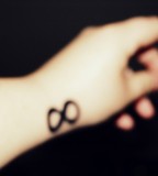 Wonderful Infinity Sign Themed Tattoo Design for Girls Sample Photo