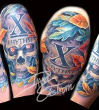 Awesome Arm Skulls Evil Dead Tattoo Design 