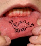Inner Lip Tattoo