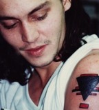 Cool Johnny Depp Arm Tattoo 