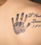 Palm and Kids Name Tattoo Design on Back
