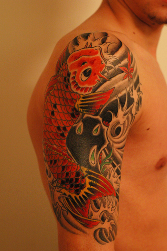 Brilliant Colors Of Koi Fish Sleeve Tattoo