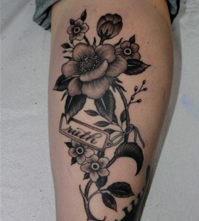 leg flower tattoo
