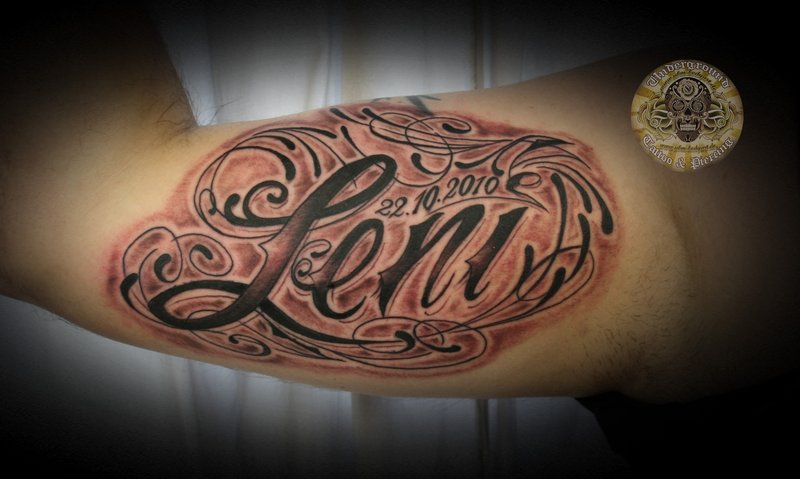Chicano Name Lettering Tattoo On Arm
