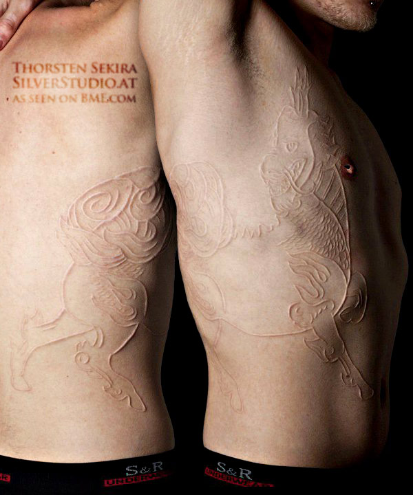 Skin Removal Tattoos by Brendan Russell