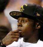 Lil wayne face and hand tattoos