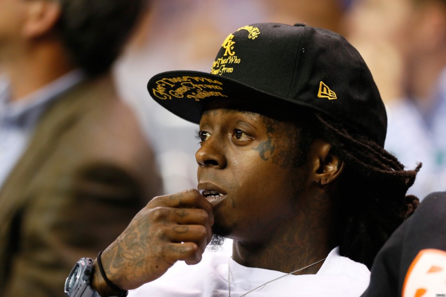 Lil wayne face and hand tattoos