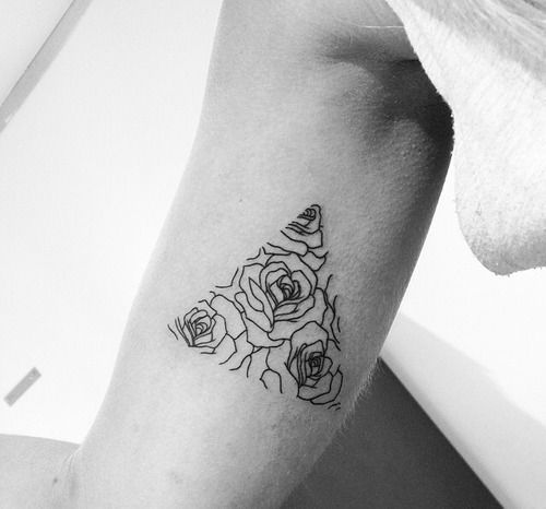 linework wrist flower tattoo