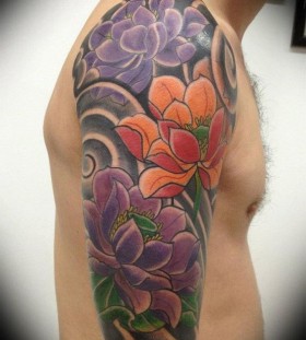 lotus flower man shoulder tattoo
