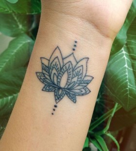 lotus on wrist flower tattoo