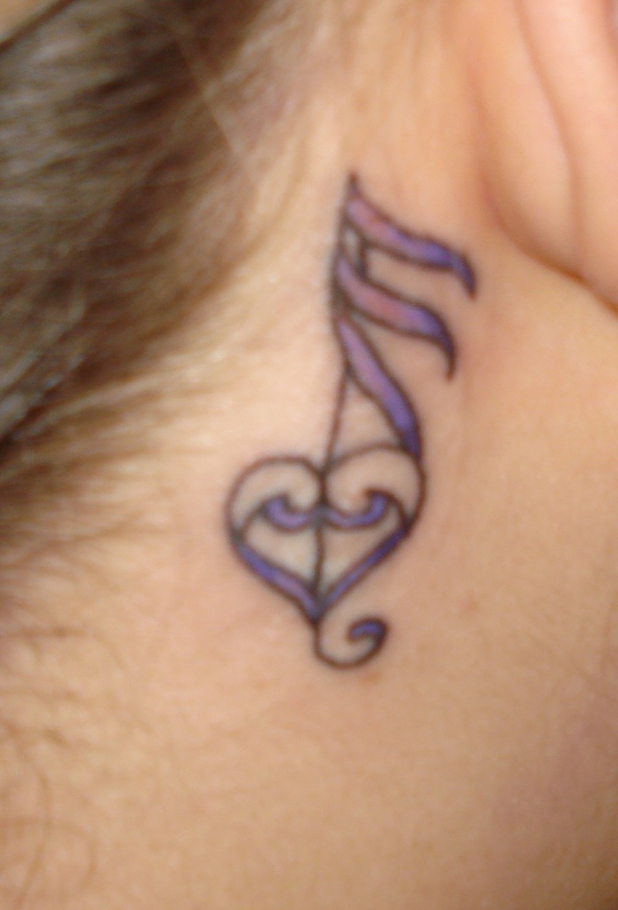 Peace Love And Music Tribe Neck Tattoo