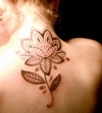 Upper Back Flower Tattoo For Girl