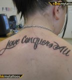 Upper Back Love Conquers Tattoo