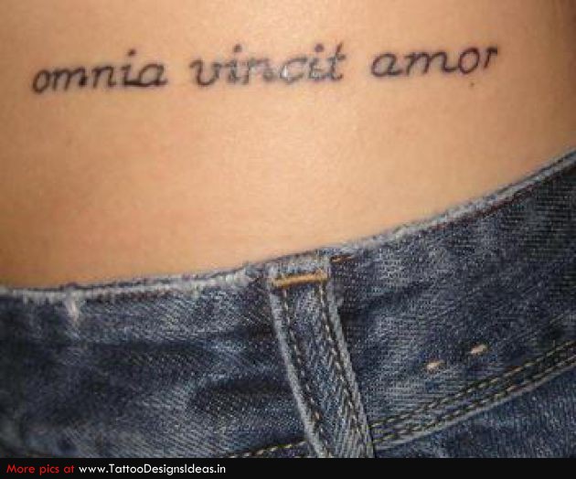 Design Of Latin Love Conquers All Tattoo On Hip