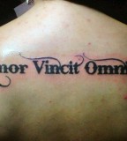 Tattoo Love Conquers All On Back By Simonvalentine