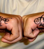 Unique Love Hate Tribal Tattoo on Hand
