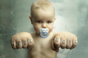 Love Hate Scripture Tattoo on Baby Finger