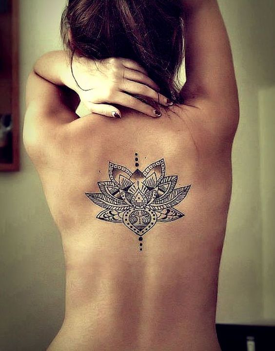 mandale style lotus flower tattoo