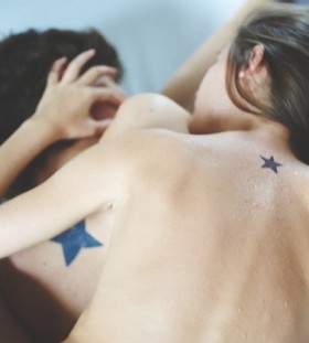 matching black star couples tattoos