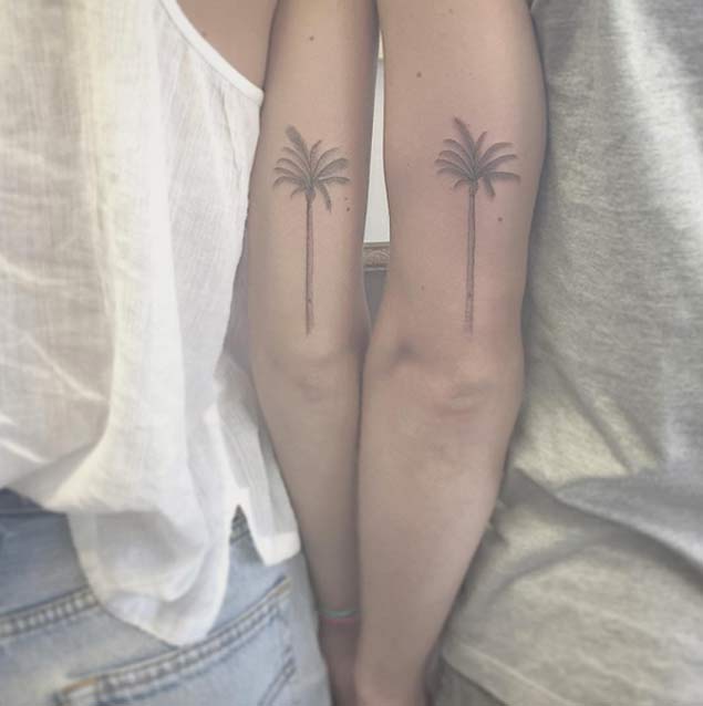 matching palm trees couple tattoo