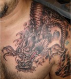 Left Chest Dragon Head Tattoo Designs