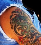 Beutiful Dragon and Koi Fish Upper-Arm Tattoo Design for Women