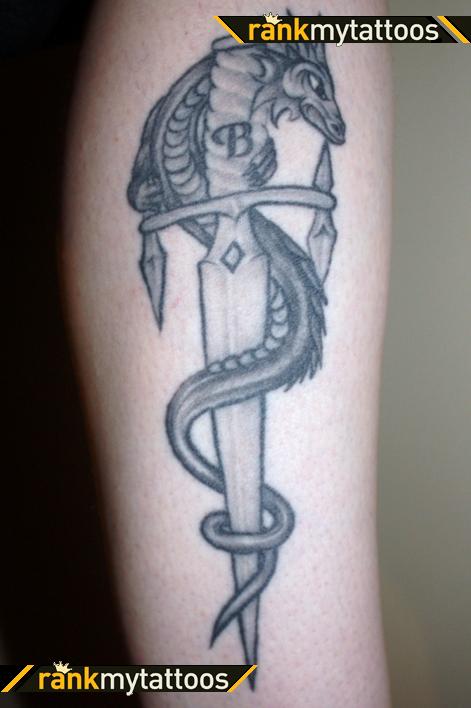 Dragon Wrapped Around A Dagger Tattoo