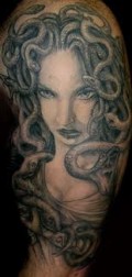 Medusa Girl Face Tattoo in Black And Gray Color