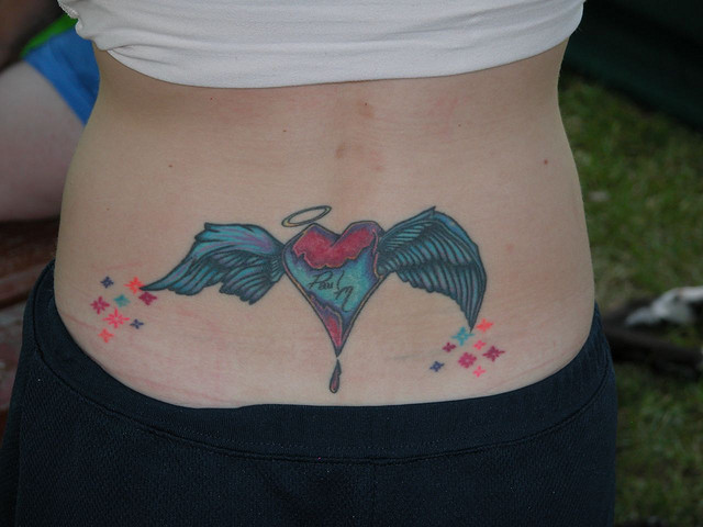 Heart In Memory Lower Back Tattoos