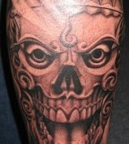 Sleeve / Upper-arm Skull Tattoo Designs - Skull Tattoos