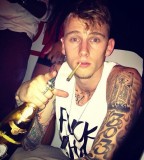 MGK Lace Up Handsome Artist Tattoo