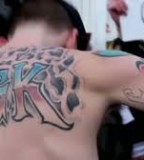 Tattoo Lifestylez Feature Rapper Machine Gun PIc
